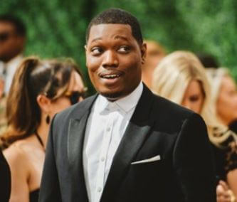 Rose Campbell son Michael Che in an event.